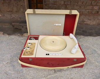 Vintage record player Solo, retro red record player made in Germany