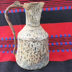 Old metal pitcher, late XIX century rustic metal pitcher