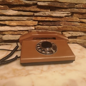 Vintage brown rotary phone, vintage desk phone