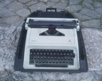 Olympia Carina 2 English alphabet typewriter, vintage 80s portable manual typewriter