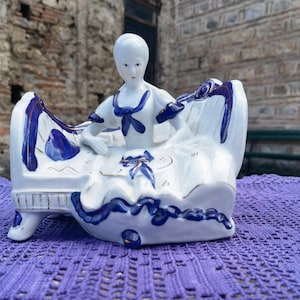 Porcelain figurine of a lady in a chair, vintage 1960&#39;s large porcelain figurine