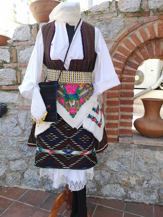 Woman's ethnic costume, traditional folklore costu