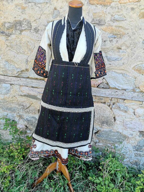 Antique women's ethnic costume, traditional folklo