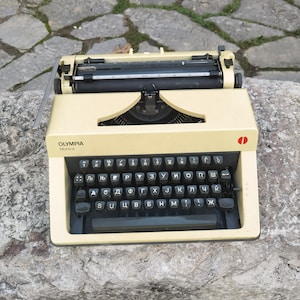 Olympia Monica portable typewriter, Cyrillic vintage typewriter with a case and a ribbon