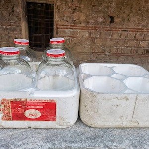 Four large Coca Cola bottles, vintage rare Coca Cola bottles