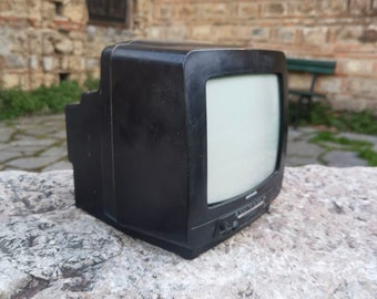 Mini portable vintage TV, black and white screen CRT television and radio receiver, Atlanta TV