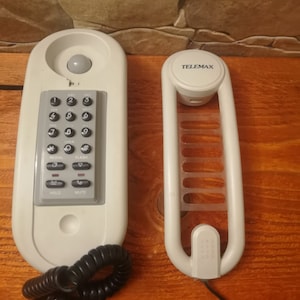 Vintage telephone, wall hanging phone, retro digital telephone