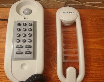 Vintage telephone, wall hanging phone, retro digital telephone