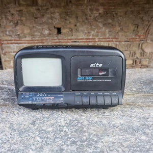 Vintage portable TV, black and white screen TV and cassette player Elta 2211