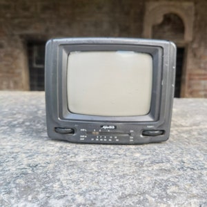 Supertech model BTV - 452 vintage mini TV, portable retro black and white TV