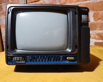 Vintage mini portable TV, black and white screen Roadstar TV-400N portable television