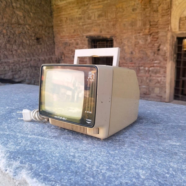 Mini star 416 C portable TV, space age vintage mini portable TV