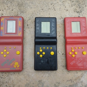 Three Tetris gamers, vintage Tetris mini portable gamers, 1990's Tetris