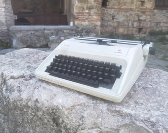 Olympia Carina 2 Macedonian Cyrillic alphabet typewriter, portable vintage typewriter with original case