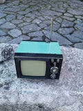 Vintage mini portable TV, black and white screen Silelis 402 D television product logo