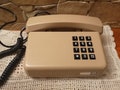 Vintage digital phone, retro 1985 telephone product logo