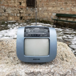 Eurotronic vintage TV, CRT TV and radio receiver, space age design portable television