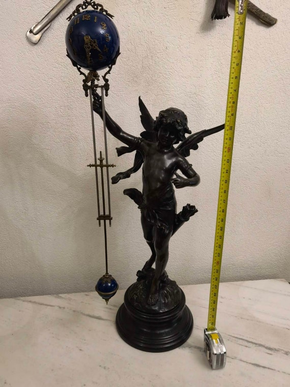 bronze cupid statue swinger clock