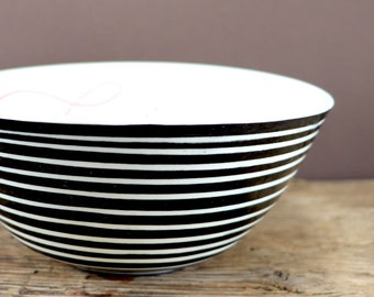 Striped porcelain bowl with butterfly