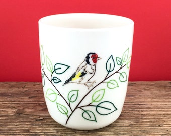 Potteried porcelain mug with goldfinch