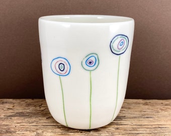 Porcelain mug with retro flowers