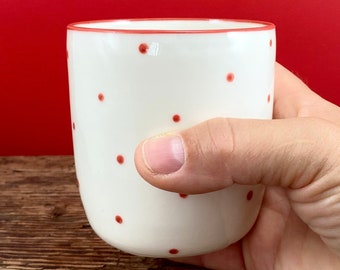 Porcelain mug with red dots