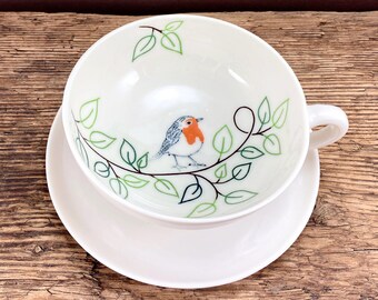 Porcelain robin teacup with saucer