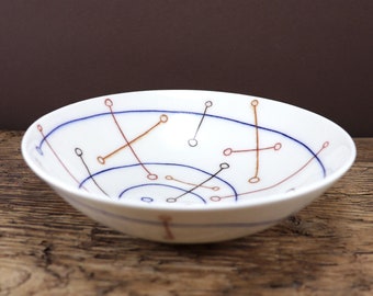 Pottery hand-painted porcelain biscuit bowl with spiral pattern