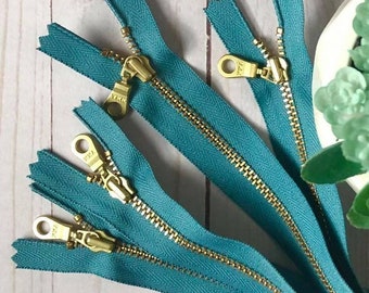 Turquoise YKK Zippers. [3, 5] Pieces. 12-inch. Brass Donut Pulls. Color 111. Metal Teeth, Closed Bottom. Purse Bag Supply.