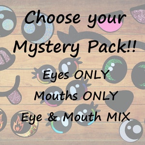 May include: A wooden background with various colourful cartoon eyes and mouths. The text "Choose your Mystery Pack!!" is at the top of the image. Below the text are three options: "Eyes ONLY", "Mouths ONLY", and "Eye & Mouth MIX".