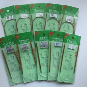 May include: A set of ten 40-inch ChiaoGoo circular knitting needles in various sizes. The needles are packaged in individual clear plastic bags with green and white labels. The labels feature the brand name "ChiaoGoo" and the size of the needles.