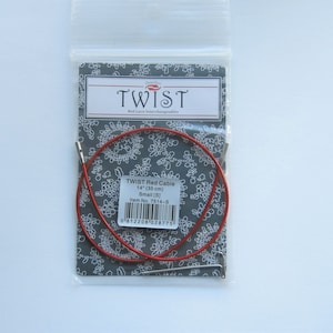 May include: Red knitting cable for circular needles, 14 inches (35 cm) long, labeled "TWIST Red Cable 14" (35 cm) Small [8] Item No. 7514-8"