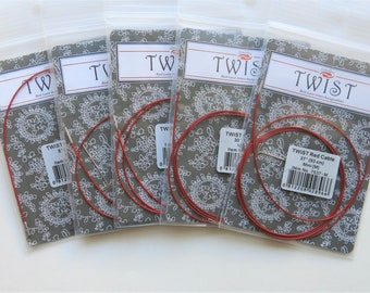 May include: Five packages of red Twist brand interchangeable knitting needles. The packages are labeled with the size of the needles in inches and millimeters. The needles are made of metal and are packaged in clear plastic bags.