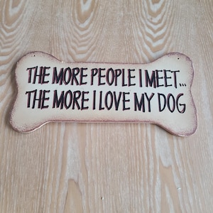 &quot;Hundewelpe Wand-Kunst-Dekor &quot;&quot;The mehr Leute, die ich treffe, desto mehr ich liebe meinen Hund&quot;&quot; geprägt wie ein Knochen.&quot;