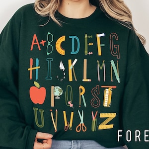 Alphabet doodle teacher shirt, kindergarten teacher long sleeve sweatshirt, field trip shirt, teacher shirt, abc teacher t-shirt, crewneck