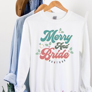 Merry & bride sweatshirt, Christmas bride sweatshirt, Christmas gift for bride, bride to be shirt, bridal shower gift, engagement gift image 2