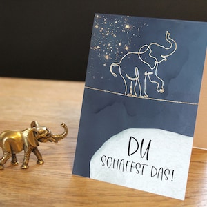 Olifant geluksbrenger voor wijsheid, energie en kracht - wenskaart met de tekst: Je kunt het! Voor het nieuwe jaar!