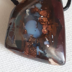 Boulder Opal from Australia with leather strap.