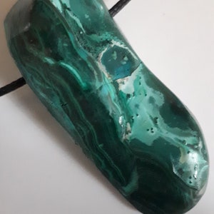 Hugely beautiful, chrysocolla in malachite with wax cord.
