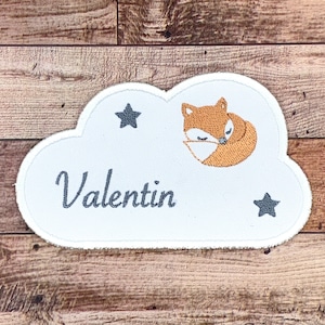 Personalized name embroidered on a cloud-shaped patch with a fox, choice of color, iron-on option available.