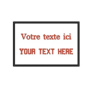 May include: A black and white rectangular patch with the text "Votre texte ici" and "YOUR TEXT HERE" in red.