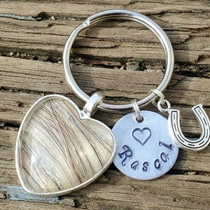 Heart shaped horse hair key chain with custom name charm and accent charm by Equine Keepsakes