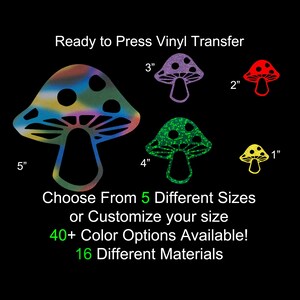 May include: Ready to Press Vinyl Transfer featuring mushroom designs in various sizes, from 1 to 5 inches. The image displays a rainbow-colored mushroom, along with purple, green, red, and yellow options. The text indicates 40+ color options and 16 different materials.