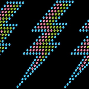 May include: Five colorful lightning bolt designs on a black background. Each bolt is composed of small, evenly spaced dots in shades of pink, yellow, and blue. The overall effect is a vibrant, pixelated graphic.