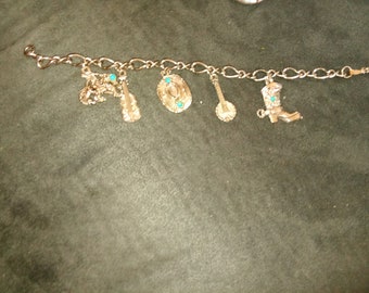 Vintage Sterling silver and turquoise charm bracelet