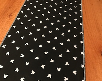 Mickey runner.  10”x 42”. Table, couch, footbed, dresser, nightstand , topper.  Hang over sides.  Living room. Bedroom. Decor. Home. Black