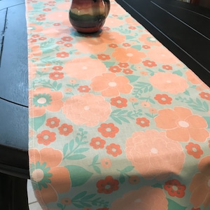 12”x 42” table runner. Dresser. Nightstand topper. Bench doily.  Foot bed decor. Mom gift poppyseed flower. Peaches blue. Kitchen.bathroom.