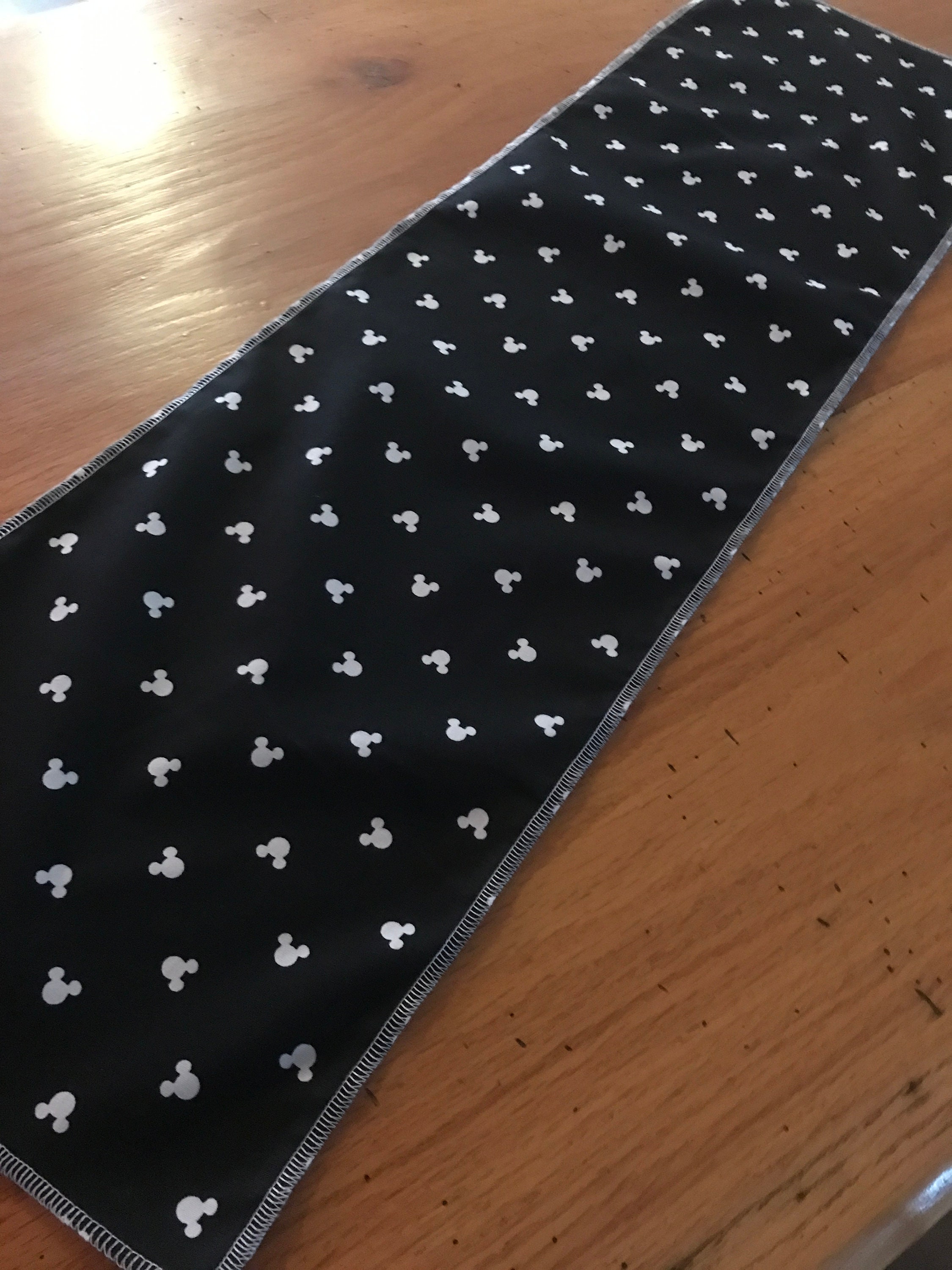 Runner made with Mickey material. Single layer runners . 10” x 36”