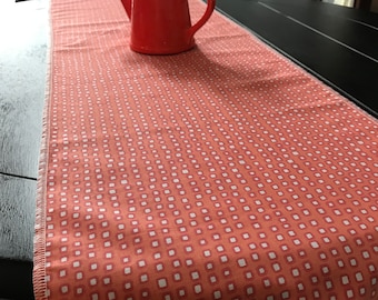 12”x 42” table runner. Orange white squares. Couch topper. Doily. Coffee bar cloth. Gift. Mom. Toilet doily. Deal. Nice present. Birthday.