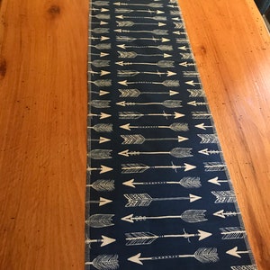 Blue and cream arrows table runner.  12” x 42” couch topper.  Foot bed decor.  End table dresser doily. Hangover. Hang up. Any room.